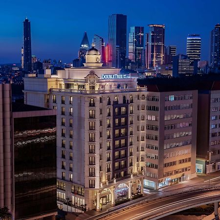 Doubletree By Hilton Istanbul Gayrettepe Hotel Exterior photo The hotel at night